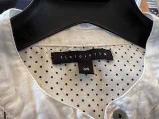 Blusa blanca sin mangas Tintoretto