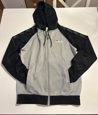 Sudadera de cremallera con cañucha de fila.