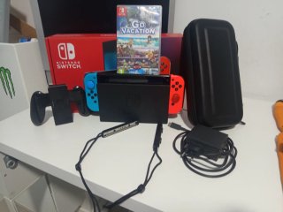 Nintendo Switch Poco Uso Azul/Rojo Negociable