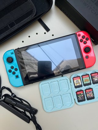 Nintendo Switch + 5 juegos + cables
