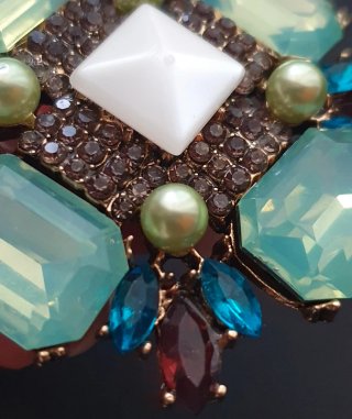 Broche joya piedras turquesa y burdeos
