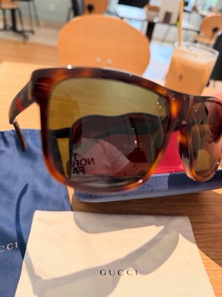 Gafas de sol Gucci marrones y negras