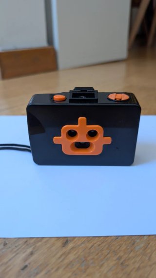 Cámara Analógica Robot3 Negra y Naranja.
