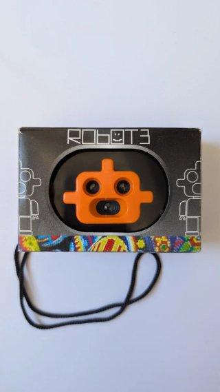 Cámara Analógica Robot3 Negra y Naranja.