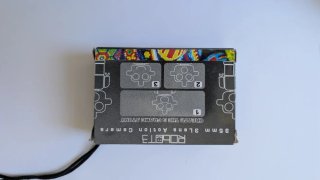 Cámara Analógica Robot3 Negra y Naranja.