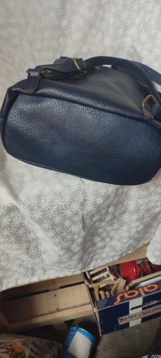 Mochila azul con flecos