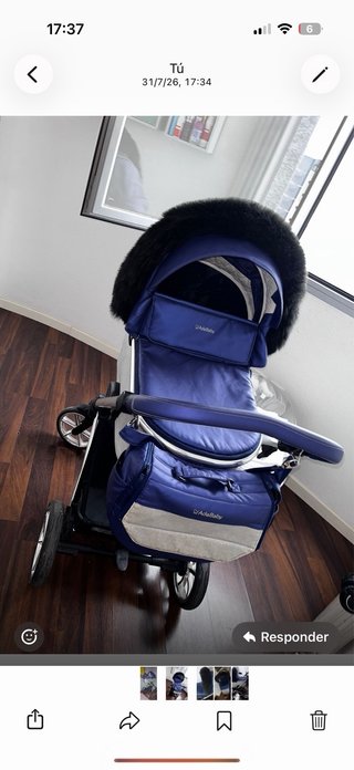 Carro de bebé azul y plateado