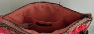 Bolso de mano.