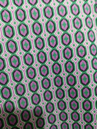 Pantaloni a zampa anni '70 fantasia geometrica