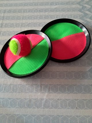 Juego de palas y pelota verano