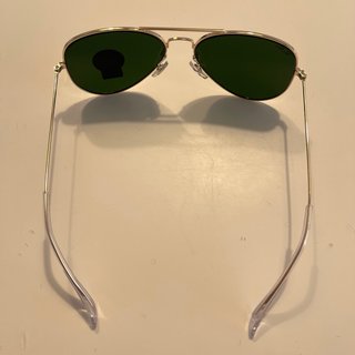 Ray-Ban Aviator RB3026 doradas con cristal verde.