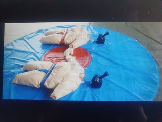 Costumi sumo per adulti con tatami