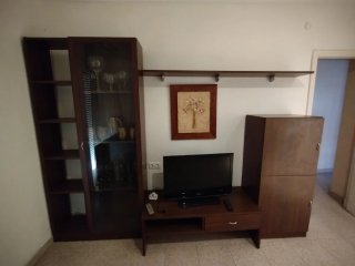 Muebles de salón madera oscura