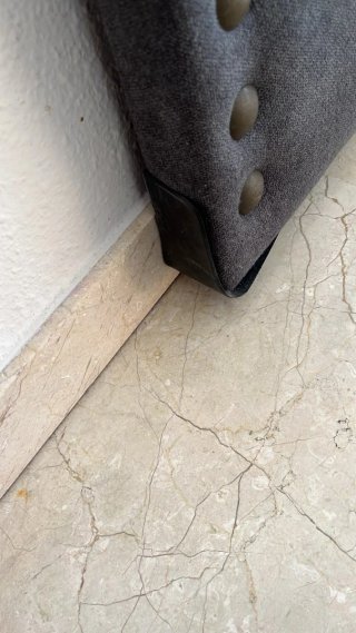 Cabecero tapizado gris para camas de 135 cm