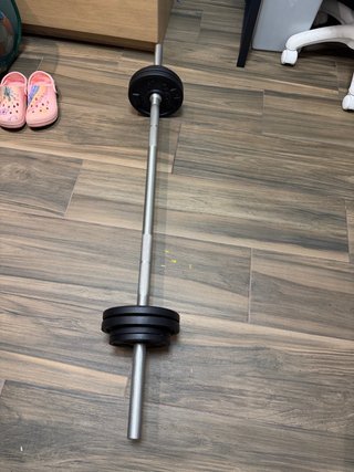 Barra y discos gimnasio