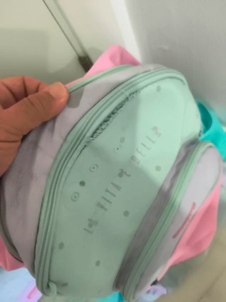 Mochila y neceser verde y rosa