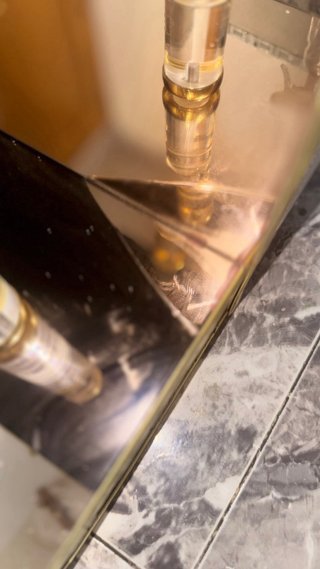 Recibidor de cristal y metal dorado