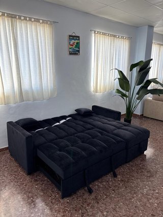 Sofá cama gris con chaise longue nuevo