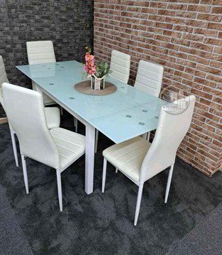 Mesa de Cristal Extensible 170cm con 6 Sillas Polipiel