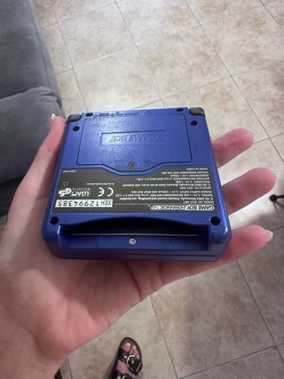 Game boy advance SP con su maletín + dos juegos.