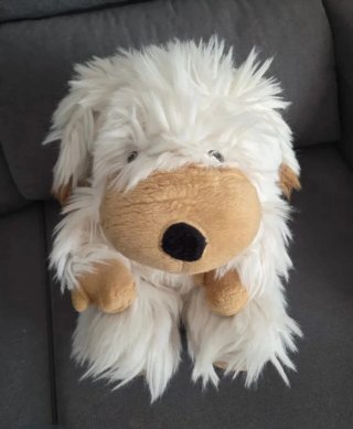 Perro peluche grande blanco y marrón