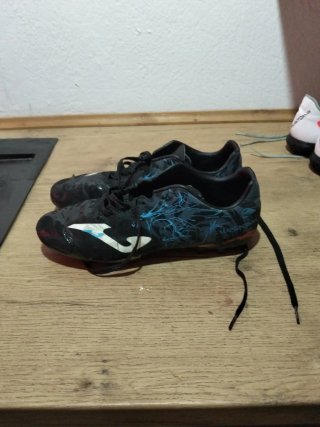 Botas de fútbol Joma tacos negras multicolor