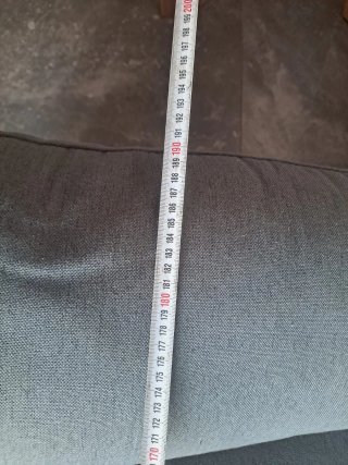 Sofá abatible gris tela