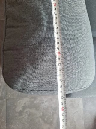 Sofá abatible gris tela