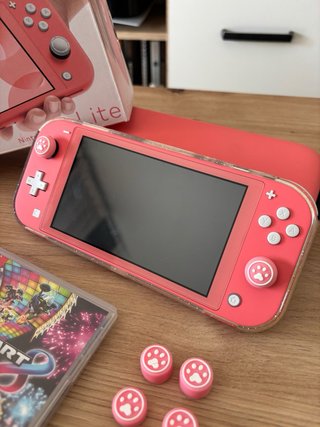 Nintendo switch lite rosa + juegos + accesorios