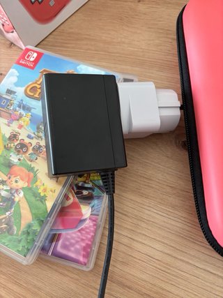Nintendo switch lite rosa + juegos + accesorios
