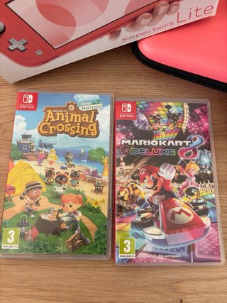 Nintendo switch lite rosa + juegos + accesorios