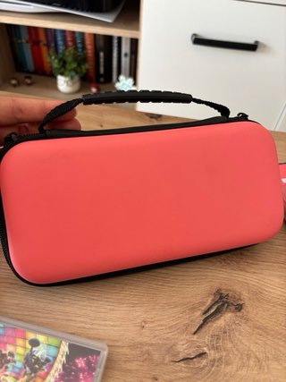 Nintendo switch lite rosa + juegos + accesorios