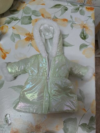 Muñeco Nenuco con abrigo verde