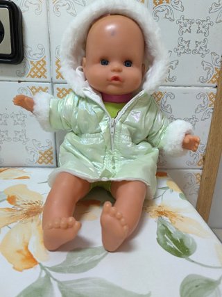 Muñeco Nenuco con abrigo verde