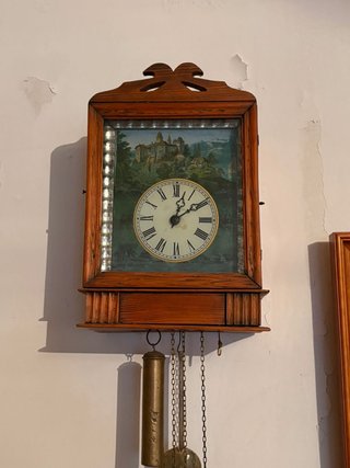 Reloj de péndulo antiguo