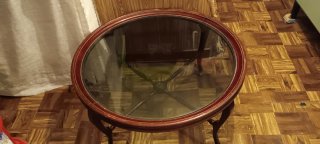 Mesa de centro ovalada de madera y cristal