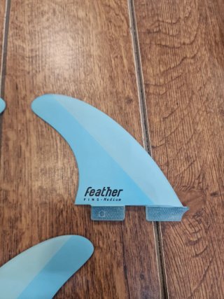 Quillas Feather Talla M (65-80kg)