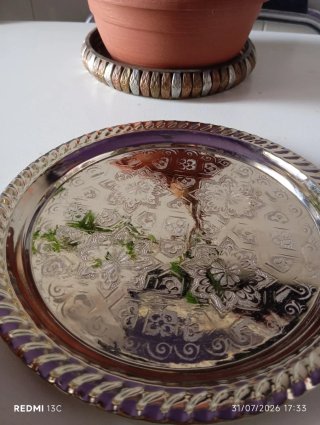 Piatto decorato in argento