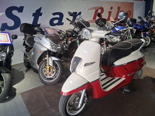 Peugeot Django 125 Scooter Roja y Blanca