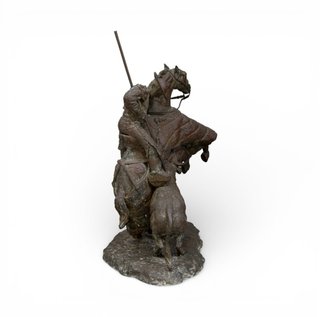 Escultura de bronce picador