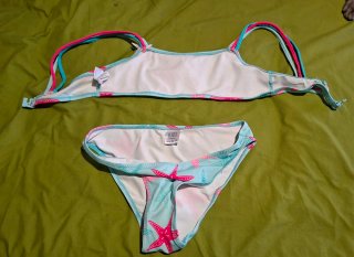 Bañador niña estrellas azul y rosa