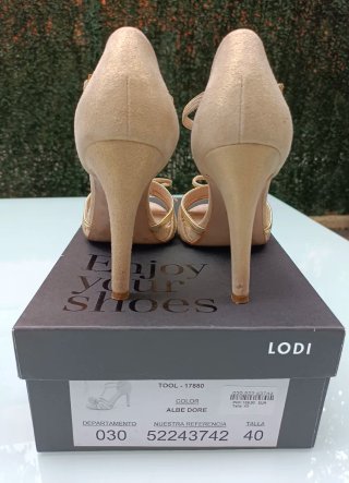 Sandalias LODI Piel Doradas Tacon Tira Lazada