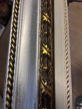 Marco de madera clásico dorado y plateado