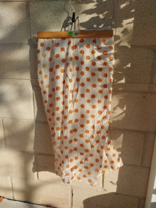 Falda larga lunares naranja y blanco