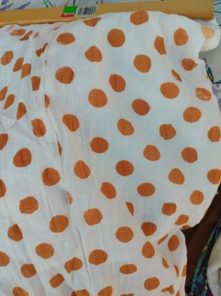 Falda larga lunares naranja y blanco