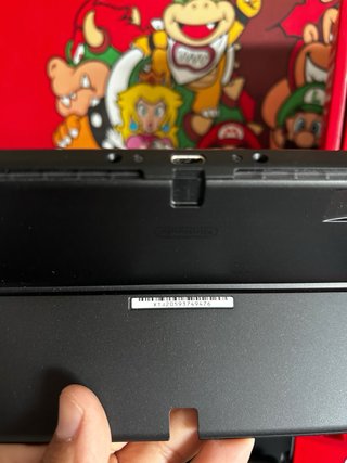 Nintendo Switch OLED COMO NUEVA aun con plasticos