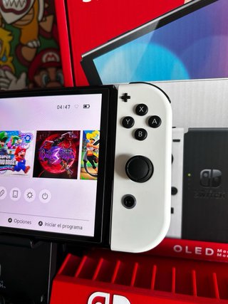 Nintendo Switch OLED COMO NUEVA aun con plasticos
