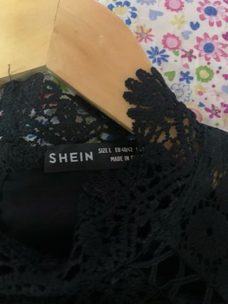 Blusa negra manga larga calada