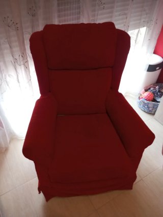 Sillón balancín giratorio rojo