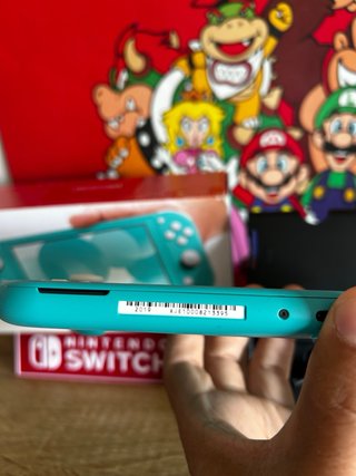 Nintendo Switch Lite COMO NUEVA 10/10